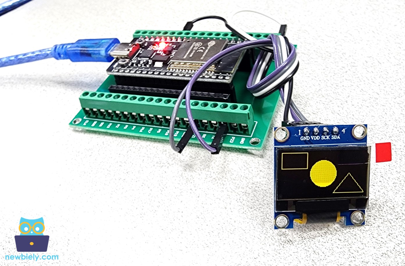 ESP32 desenhando retângulo, círculo e triângulo no OLED